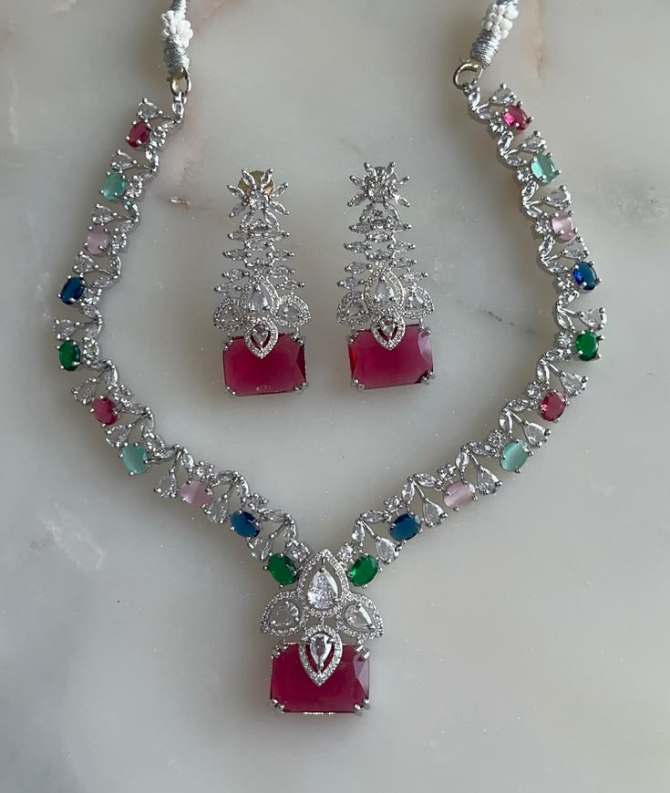 Make-a-statement-with-this-gorgeous-Sparkly-American-Diamond-Doublet-Stone-necklace-and-earrings-combo💎✨.jpeg
